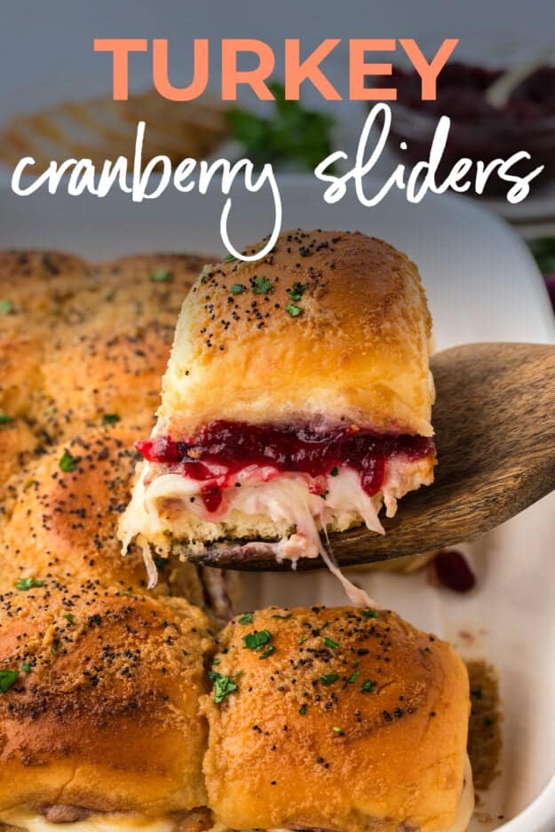 Turkey sldiers with cxranberry sauce on spatula.