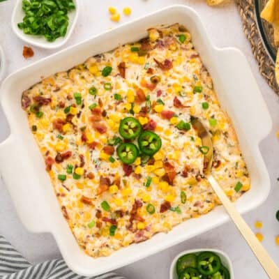 Overhead view of crack corn dip in 8x8 baking dish.