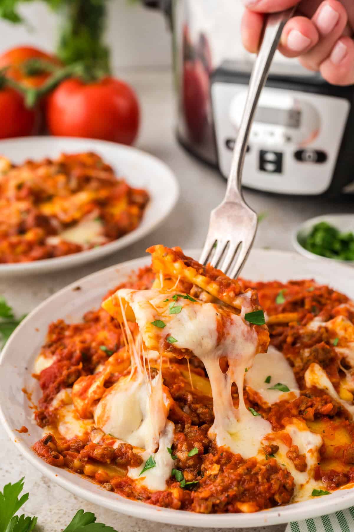 Crockpot ravioli on fork.