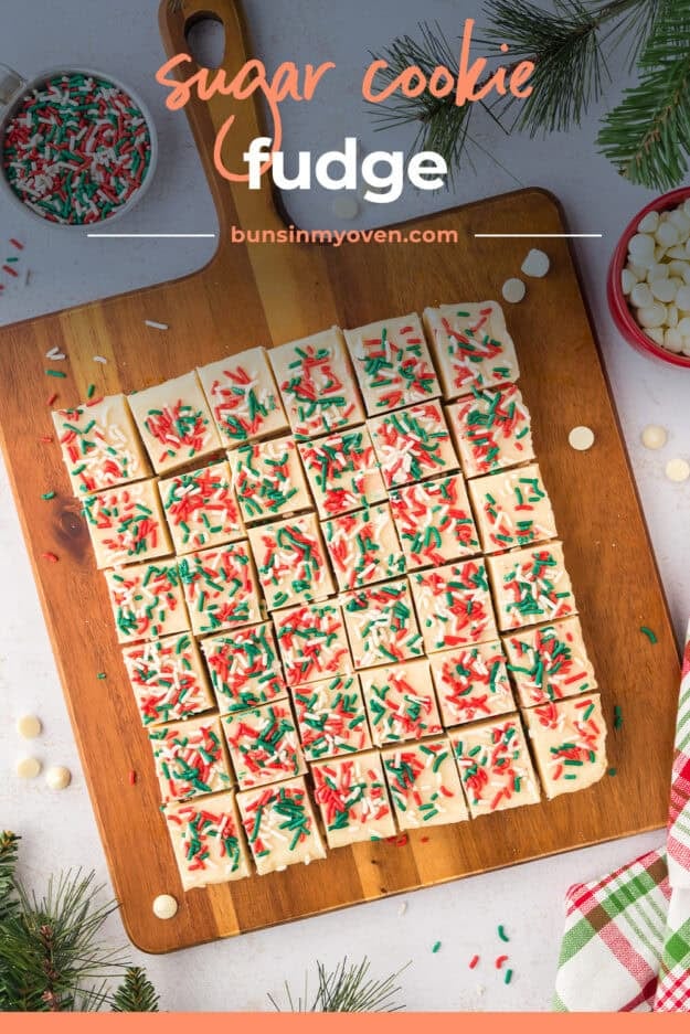 Sliced sugar cookie fudge on cutting board.