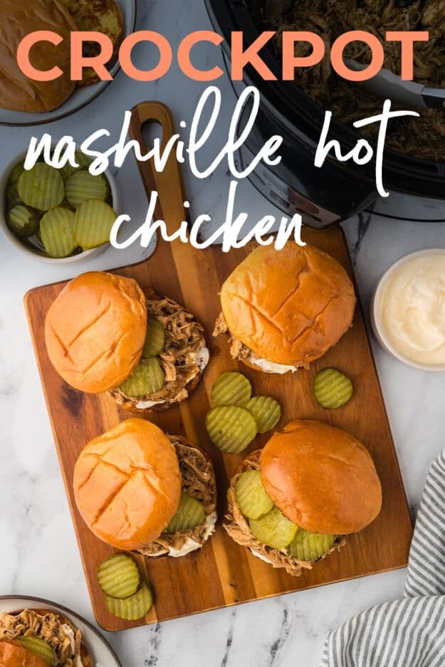 Nashville hot chicken on wooden board.