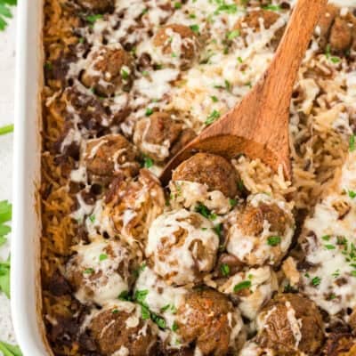 Baked meatballs and rice in 9x13 baking dish.