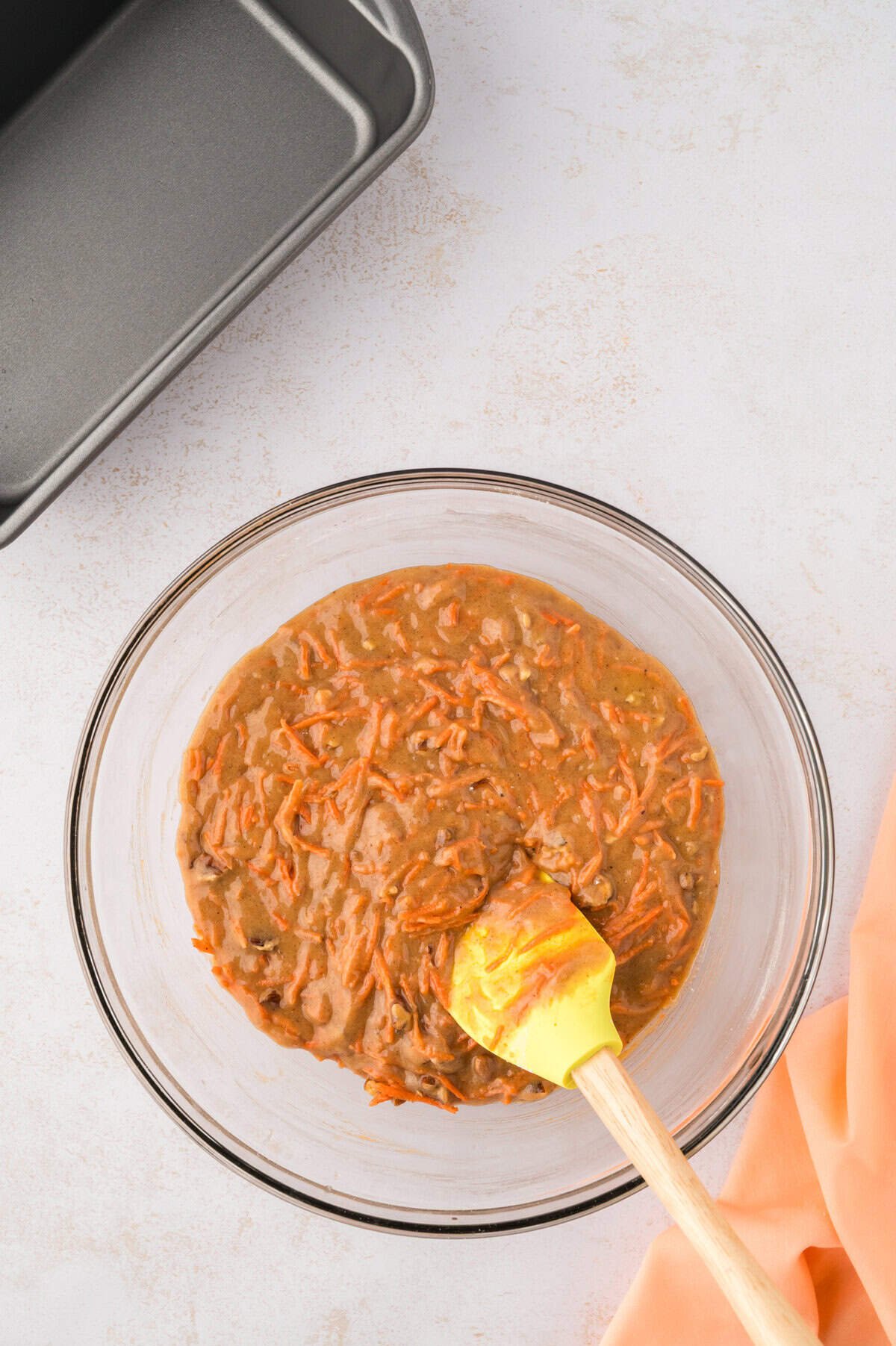 Carrot cake bread batter in mixing bowl.