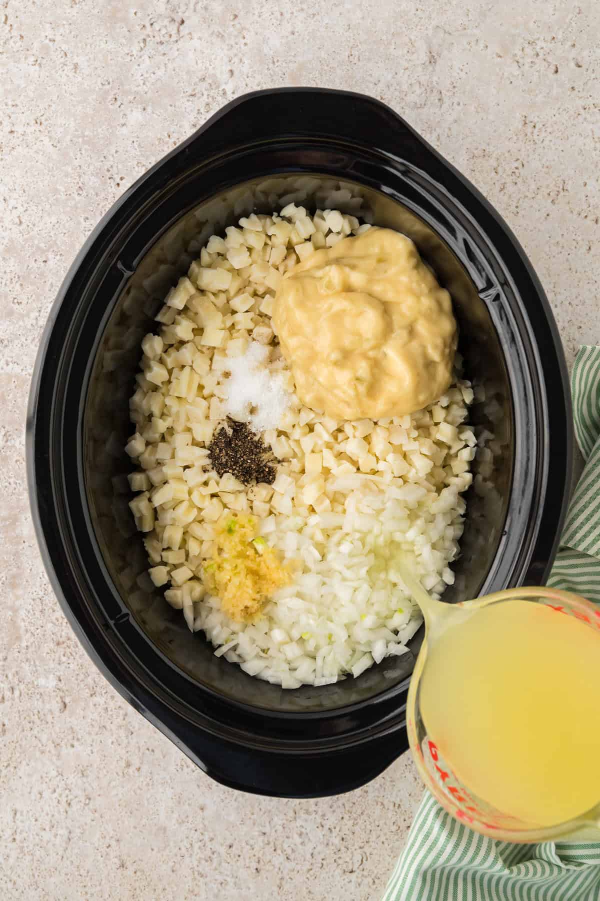 Ingredients for soup in crockpot.