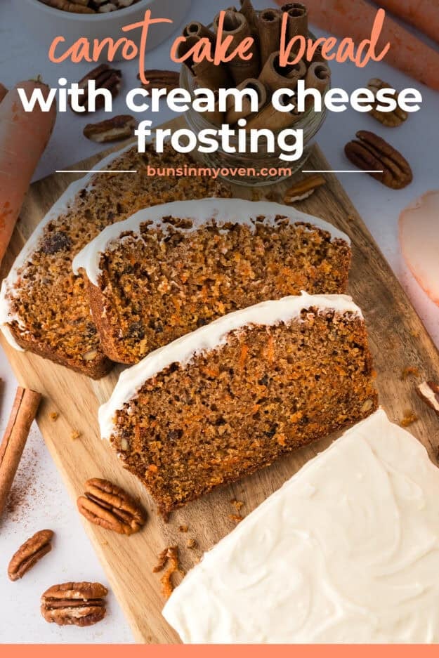 Slices of carrot cake bread on wooden tray.