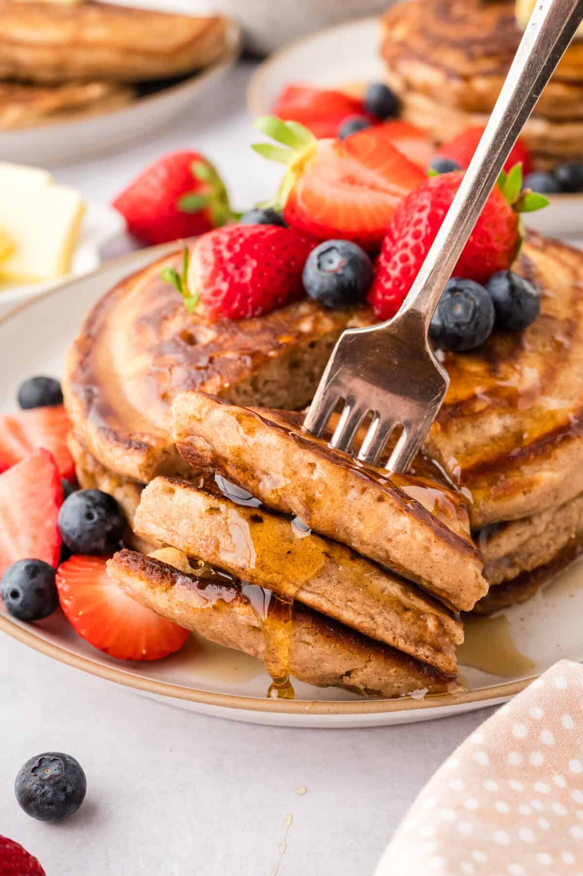 Fork full of buttermilk pancakes.