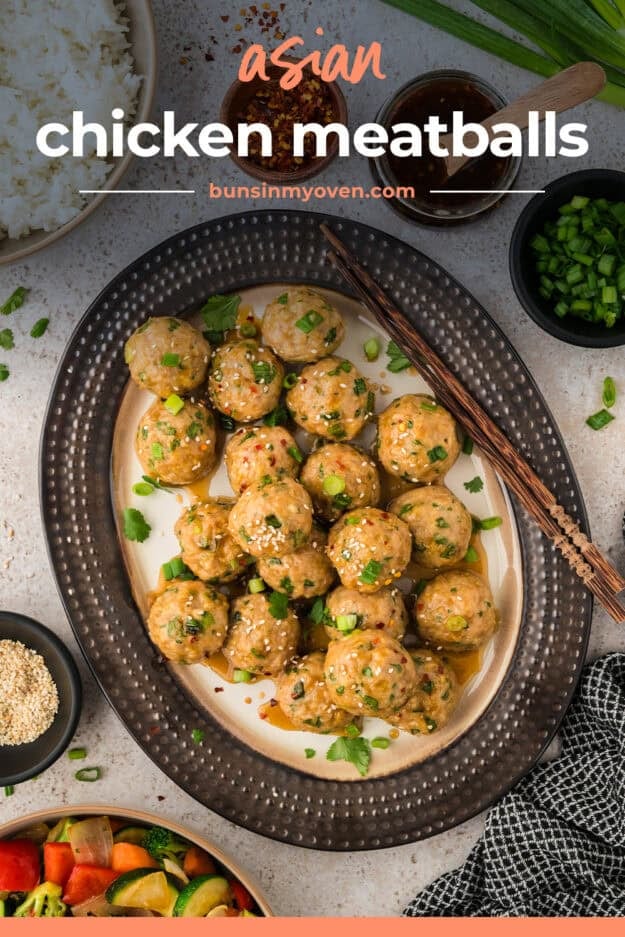 Platter stacked with chicken meatballs in an Asian sauce.