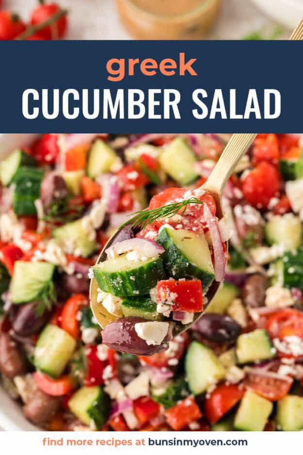 Greek cucumber salad on serving spoon.
