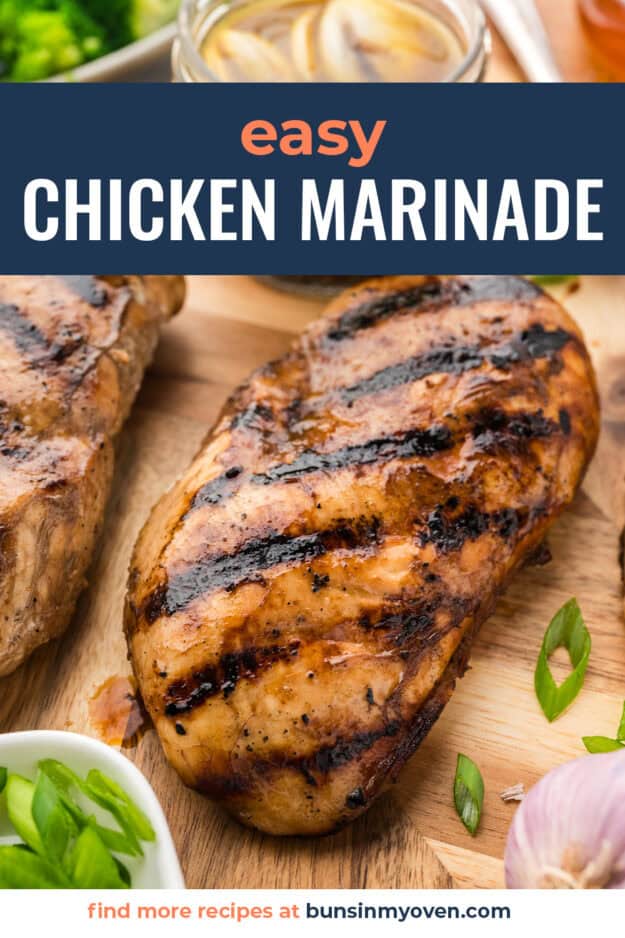 Grilled chicken on cutting board.