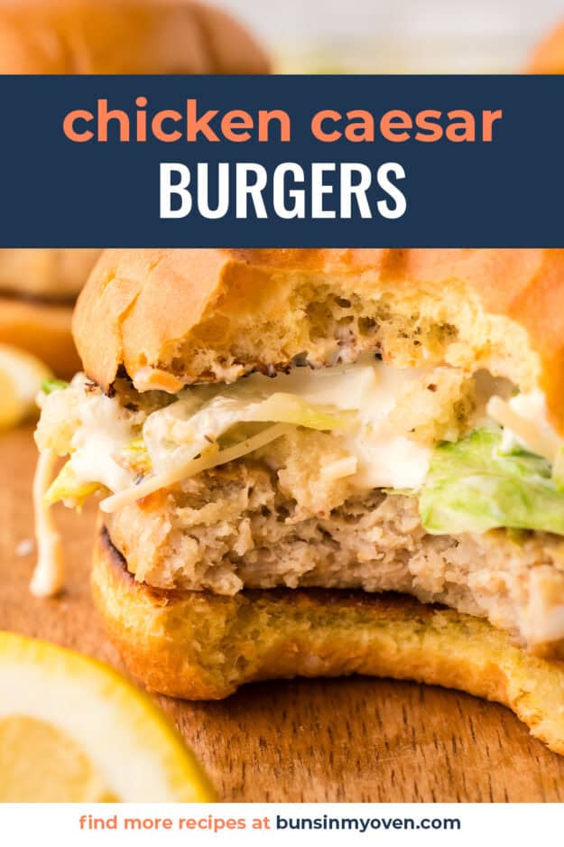 Chicken Caesar Burgers with a bite taken out of it.