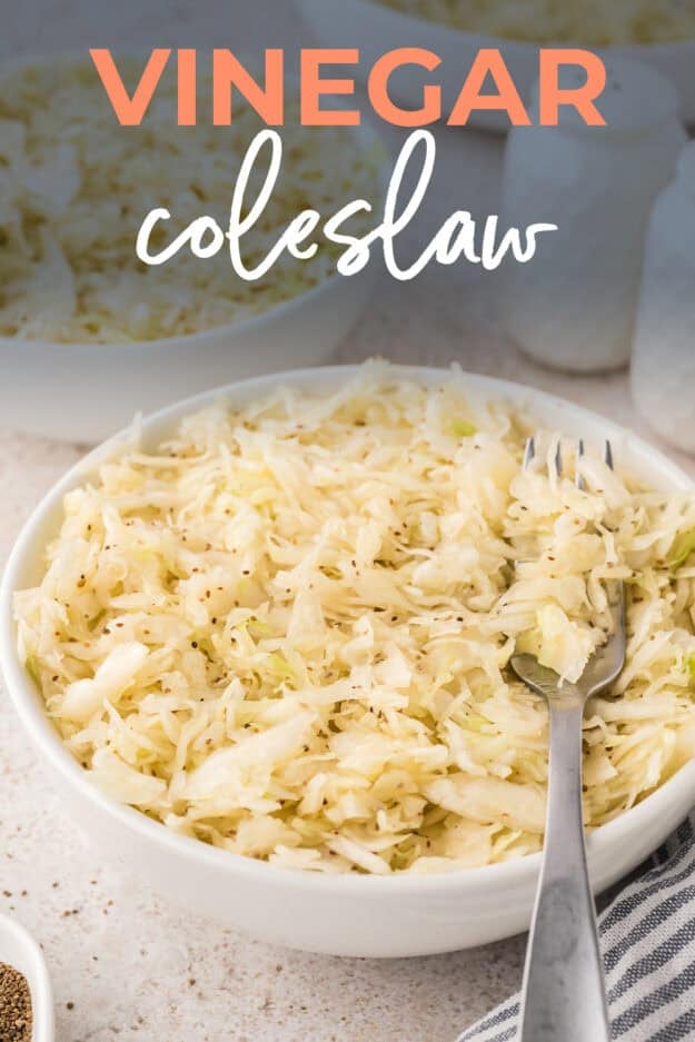 Coleslaw without mayo in white bowl.