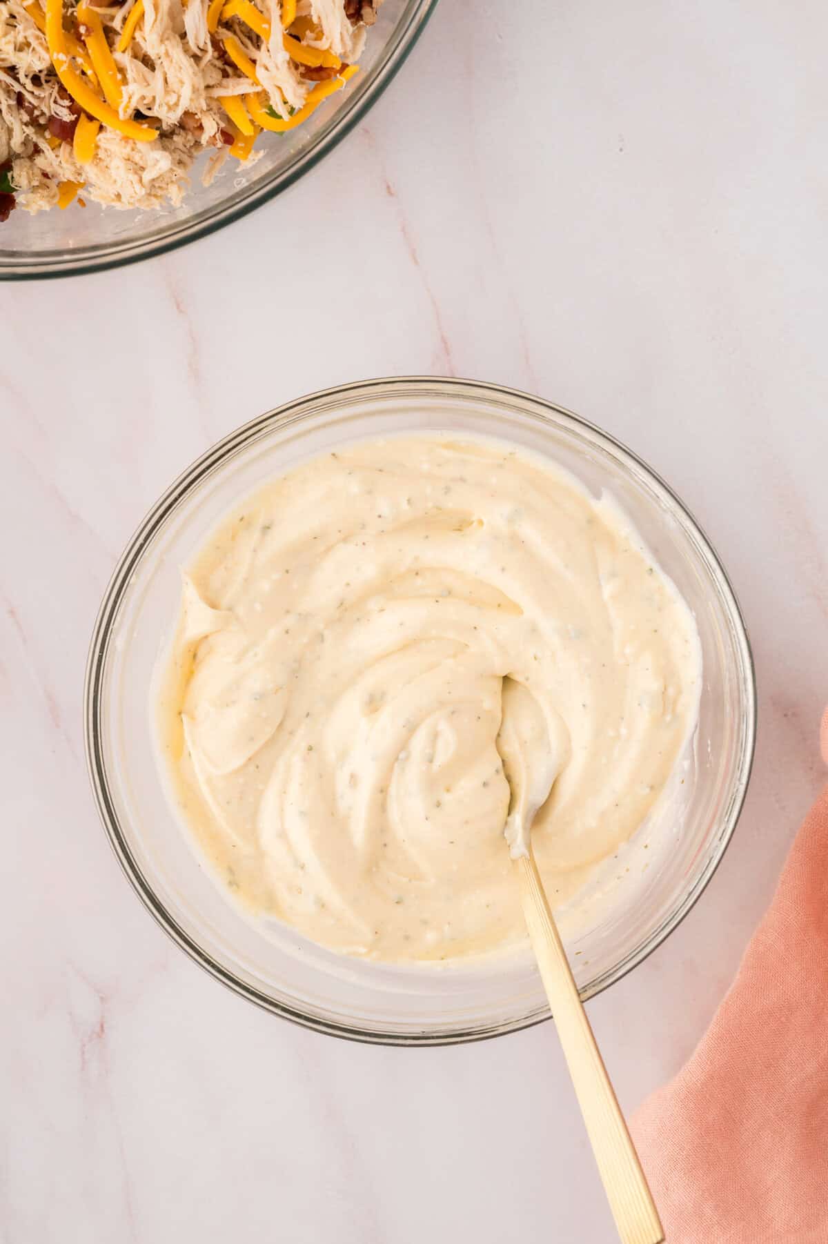 Dressing ingredients in mixing bowl.