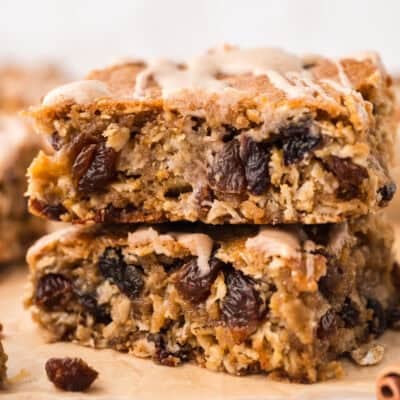 Stack of oatmeal raisin cookie bars on counter.