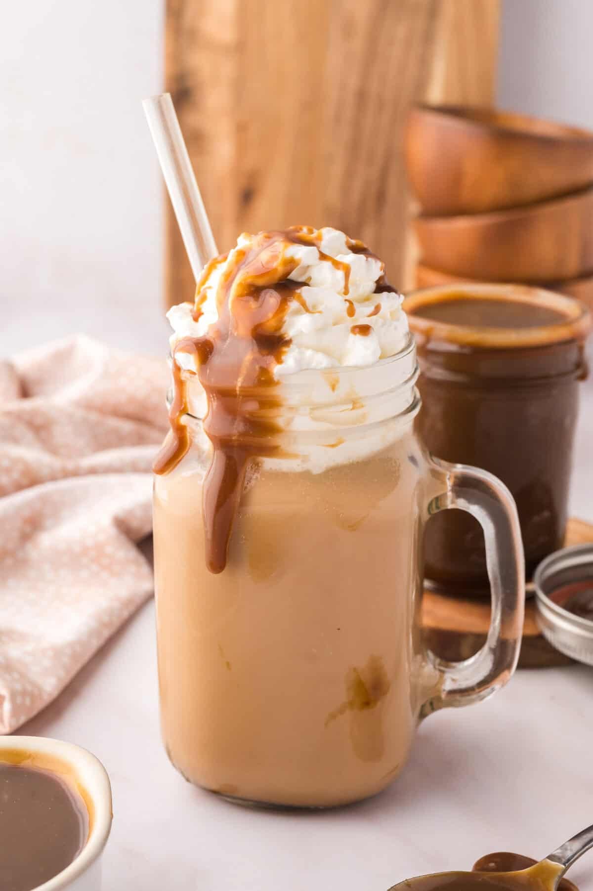 Butterscotch latte in mason jar with handle.