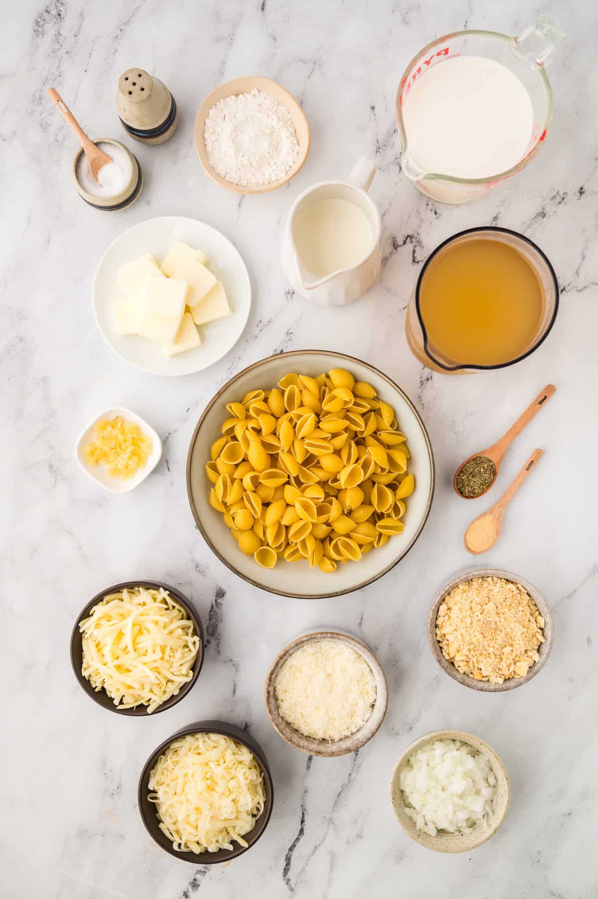 Ingredients for mac and cheese soup recipe laid out on counter top.