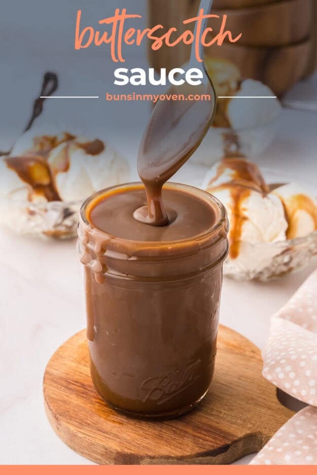 Spoonful of butterscotch over mason jar.