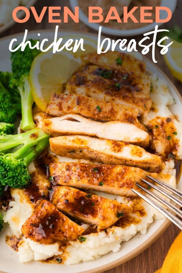 Sliced chicken breast on plate with mashed potatoes.