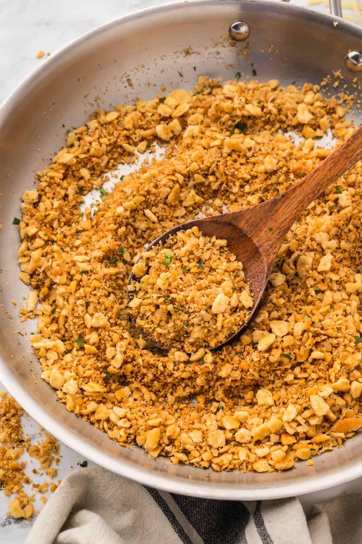 Toasted cracker crumbs in skillet.